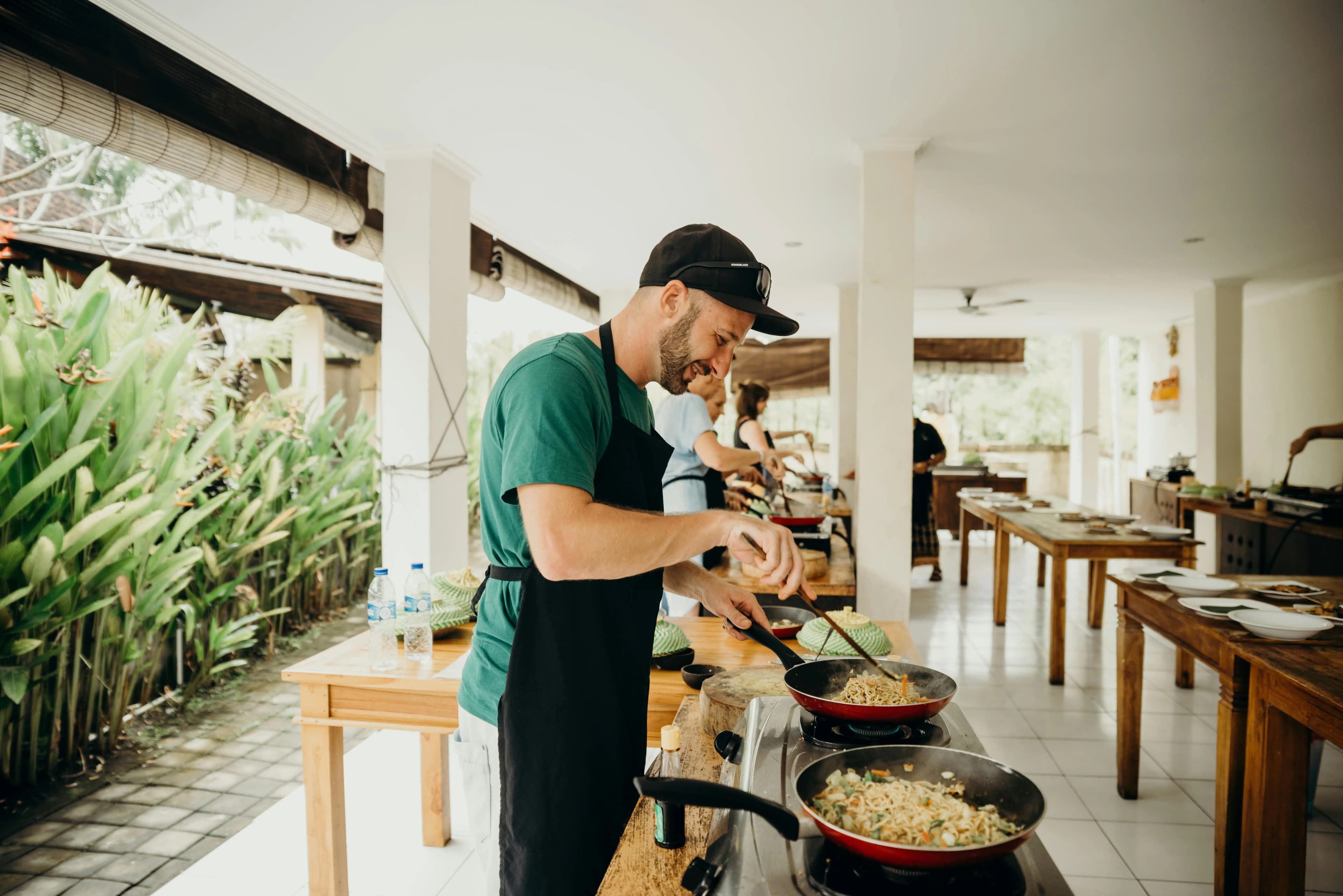 Group enjoying a Mediterranean cooking master class in a private villa