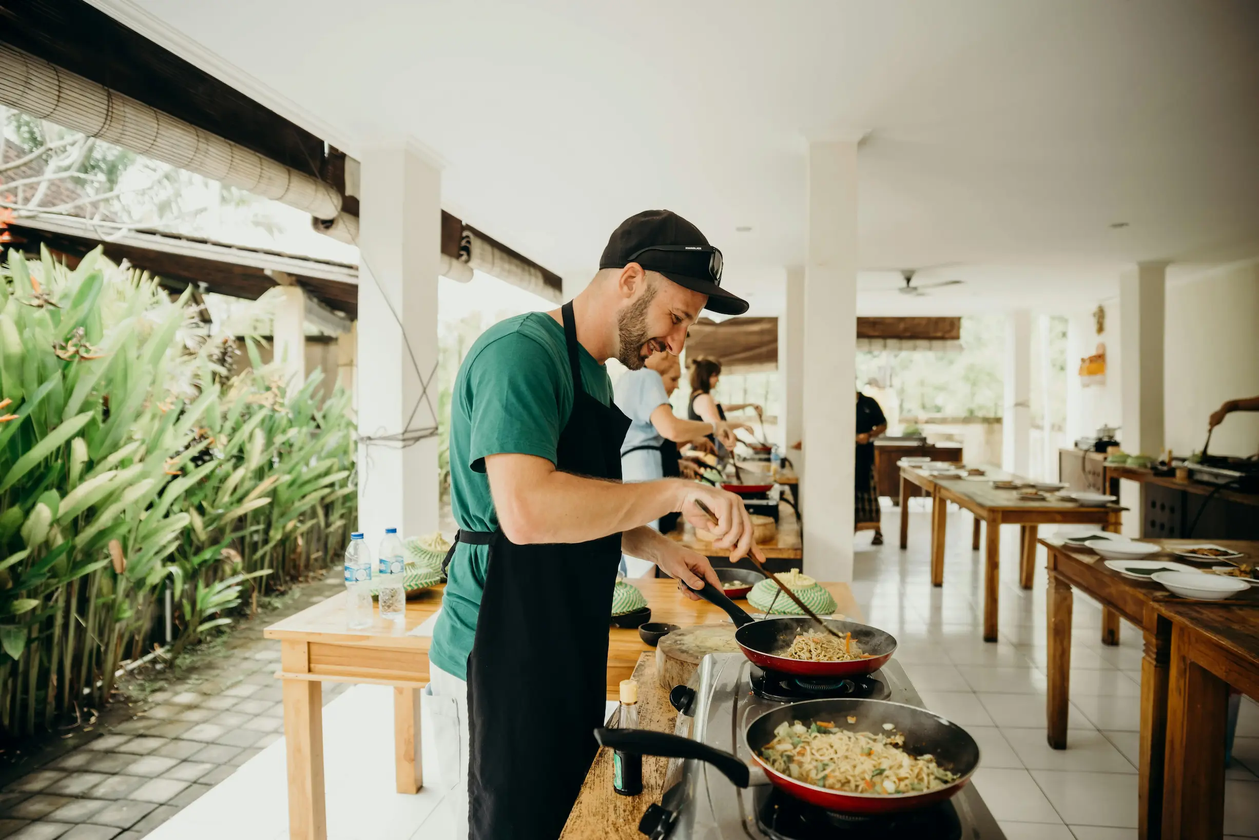 Group enjoying a Mediterranean cooking master class in a private villa